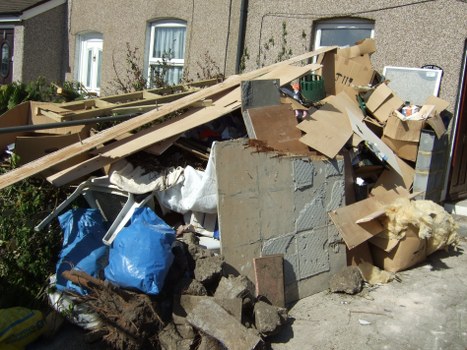 Construction site with debris being cleared